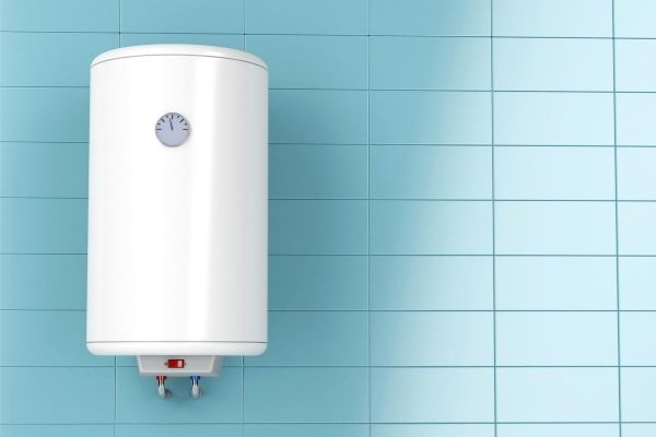 Tankless Water Heater on blue tile wall conserves indoor water