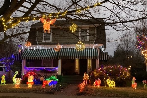 Outdoor Christmas lights and decorations on house and trees